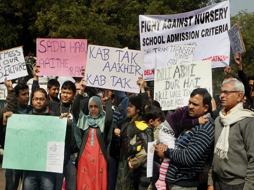 Parents protesting against the Nursery school admission criteria in New Delhi on Sunday. PTI File Photo