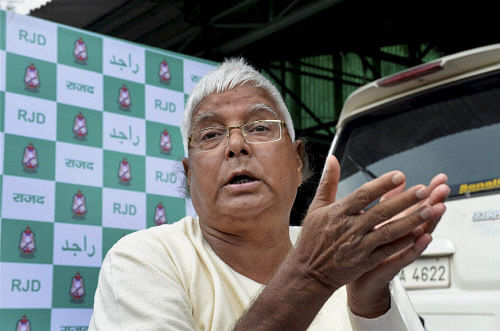 RJD chief Lalu Prasad addressing a press conference at his residence in Patna on Saturday. PTI Photo