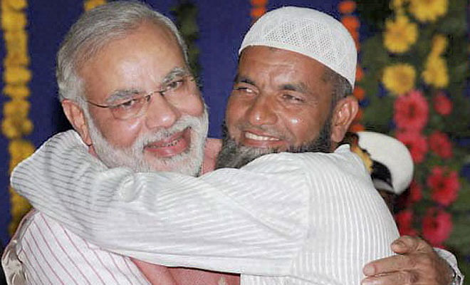 Gujarat Chief Minister Narendra Modi is greeted by a Muslim at a reception hosted in Bhuj in Kutch district. (PTI file photo).