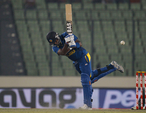 Sri Lanka's Angelo Mathews plays a shot during the Asia Cup one-day international cricket tournament match against Bangladesh in Dhaka, Bangladesh, Thursday, March 6, 2014. (AP Photo/A.M. Ahad)