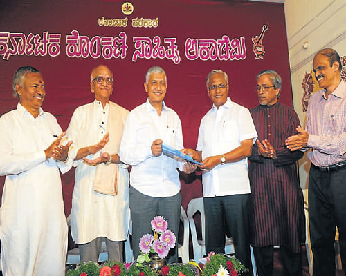 MLA J R Lobo hands over appointment order to Ronald S Castelino in Mangalore on Thursday. DH Photo