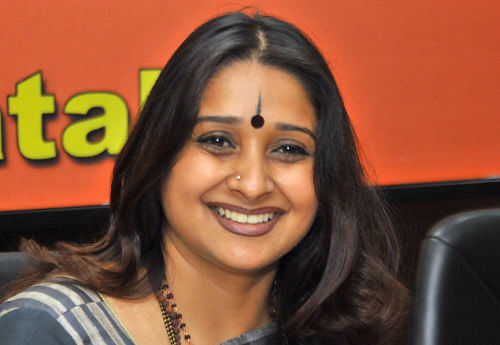 ''For the last 15 or 20 days Bangalore has been seeing various advertisements where Nandan Nilekani proclaims himself to be the giver of about 60 crore Aadhar cards to Indians,'' Karnataka BJP Co-spokesperson Malavika Avinash told reporters after complaining to Chief Electoral Officer Anil Kumar Jha. DH file photo