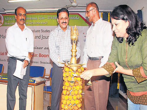 Senior Production Manager at Doordarshan (Bangalore) H N Arathi inaugurates a national seminar on the theme 'Social networking media - A boon or a bane?' at SDM College in Ujire on Friday. DH Photo