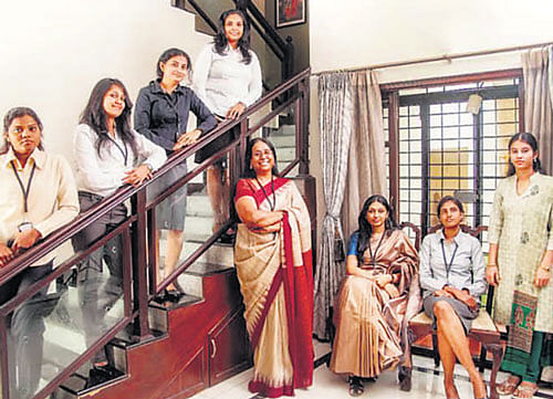 Saraswathi Venkateshwaran (fourth from right), founder and president of CEO Search India, with her team.