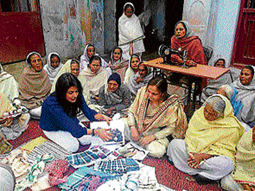 Widows in Vrindavan learn to design western outfits.