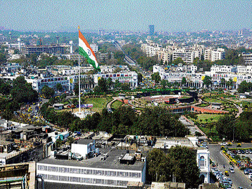 The national flag flies from a 207-foot flagpole at the Central Park in Connaught Place, New Delhi on Friday. DH Photo
