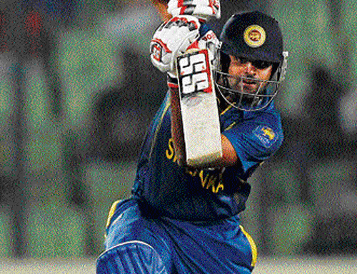 in fine fettle: Sri Lanka's opener Lahiru Thirimanne essays a drive en route his  hundred against Pakistan in the Asia Cup final at Dhaka on&#8200;Saturday. PTI