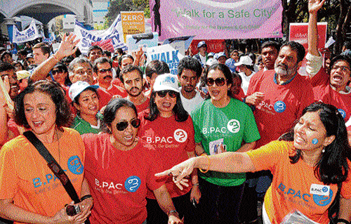 sensitising: Biocon MD Kiran Mazumdar Shaw, danseuse Vani Ganapathi, athlete Ashwini Nachappa and Mohandas Pai take part in a rally to create awareness on women's safety, in Bangalore on Saturday. dh photo