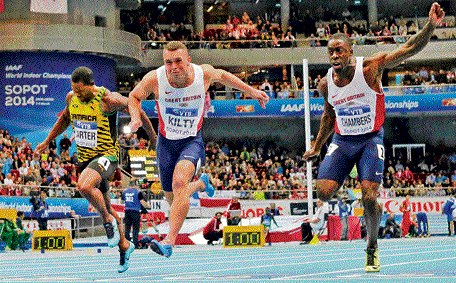 photo finish: Briton Richard Kilty (centre) pips compatriot Dwayne Chambers (right) and Jamaica's Nesta Carter to win the gold in the 60M final of the World Indoor Athletics Championships in Sopot on Saturday. AP