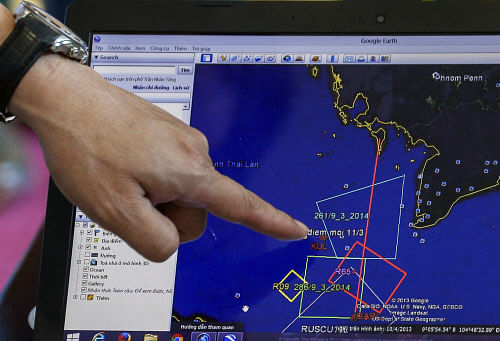 A map of a flight plan is seen on a computer screen during a meeting before a mission to find the Malaysia Airlines flight MH370 that disappeared from radar screens in the early hours of Saturday, at Phu Quoc Airport on Phu Quoc Island March 10, 2014. The disappearance of the Boeing 777-200ER jetliner is an 'unprecedented mystery', the country's civil aviation chief said on Monday, as a massive air and sea search now in its third day failed to find any trace of the plane or 239 people on board. REUTERS/Athit Perawongmetha