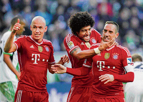 awesome force: Arjen Robben (left), Dante (centre) and Franck Ribery will be key for Bayern Munich against Arsenal. reuters