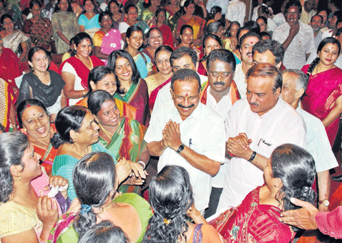 seeking support: BJP candidate for Bangalore North Lok Sabha constituency D V Sadananda Gowda and candidate for  Bangalore South H N Ananth Kumar interact with the party workers at a convention in Bangalore on Monday. dh photo
