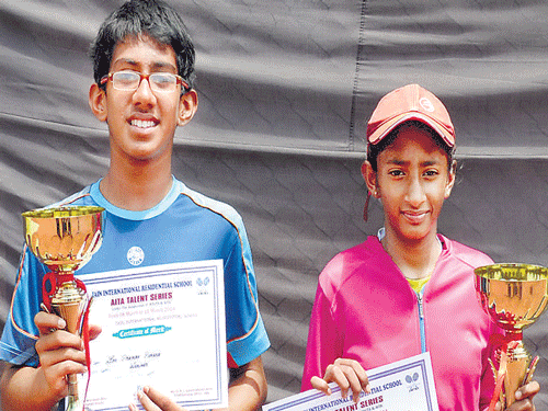 Sai Pranav Ponaka (left) and S B Apoorva, winners in the AITA Talent Series tennis tournament on Tuesday. DHNS