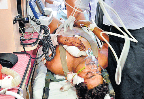 An injured CRPF&#8200;personnel being given medical aid in Raipur on Tuesday. AP