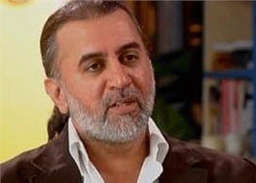 Former Tehelka editor-in-chief Tarun Tejpal, who is in judicial custody here, regularly telephoned from prison a Delhi-based woman business associate, an inquiry report said Wednesday. PTI File Photo