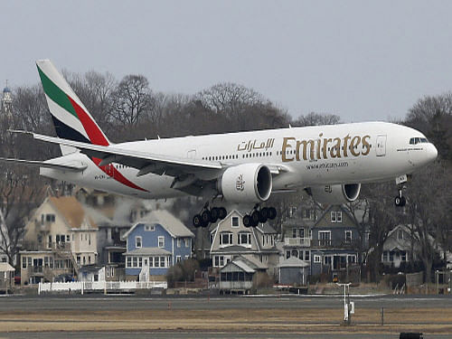 An Emirates Airlines Boeing 777 lands at Logan International Airport in Boston, Monday, March 10, 2014. The US Federal Aviation Administration (FAA) had warned of a 'cracking' problem on Boeing-777 airplanes, just days before the Malaysia Airlines flight MH370 went missing. AP Photo.
