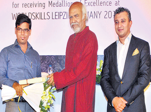 Bhabesh Chandra Jana receiving Medallion of Excellence, March 15, 2014, DHNS