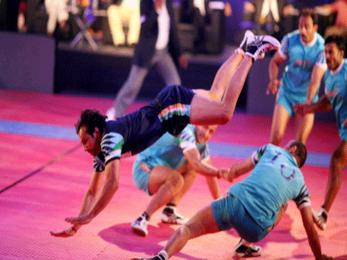 Sportsmen participate in an Exhibition match during the announcement of Pro Kabaddi league in Mumbai on Friday. PTI Photo