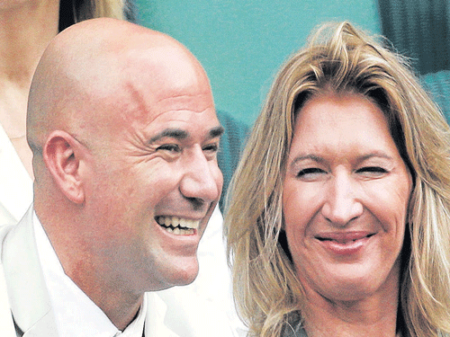 Agassi, seen with wife Steffi Graf here, was a master in plotting his rival's downfall, seemingly playing a high-speed game of chess on court.