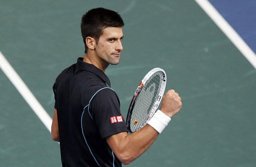 Serbia's Novak Djokovic and American John Isner cruised into the last four of the BNP Paribas Open here on Friday with straight-sets wins in the quarterfinals, AP File Photo