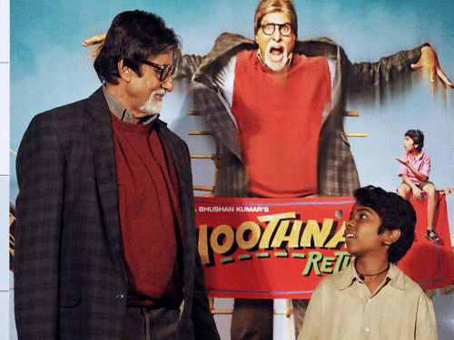 Amitabh Bachchan with co-actor Parth Bhalerao during the promotion of his upcoming film 'Bhoothnath Returns' in Mumbai on Tuesday. PTI Photo