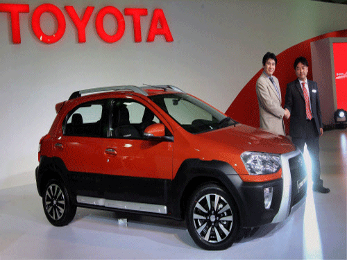 Toyota Kirloskar Motor on Sunday declared lockout at its two manufacturing plants at Bidadi near Bangalore, following the failure of talks between the management and the union over wage negotiations. Managing Director, Naomi Ishii and Toyota Motor Company Chief Engineer Akio Nishimura unveil the Etios Cross car during the 12th Auto Expo 2014 in Greater Noida. PTI File Photo