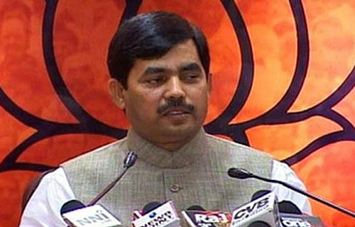 'If Arvind Kejriwal wants to remain in limelight, he has to chant 'Namo Namo'. He knows that he is doing 'Modi-Modi' only to remain in news,' BJP spokesperson Shahnawaz Hussain said. PTI File Photo
