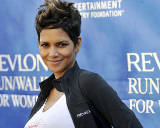 Actress Halle Berry's role in the upcoming 'X-Men: Days of Future Past' movie has been reportedly cut down. AP photo