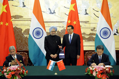 While Prime Minister Manmohan Singh and Chinese Premier Li Keqiang signed an agreement pledging restraint on border issues, frequent quarrels are initiated by the Indian side along the Sino-Indian border, an article on the state-run Global Times' website said. rEUTERS FILE PHOTO