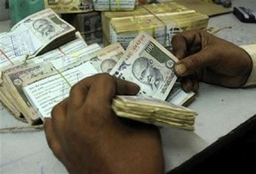 It's raining cash in Andhra Pradesh as the politicians in the southern state have broken all previous records of using money power to bribe the voters. File photo -PTI