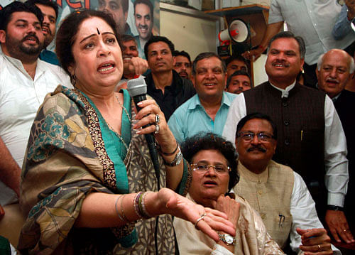 BJP Lok Sabha candidate actress Kirron Kher addresses a meeting at the party office in Chandigarh on Tuesday. PTI Photo