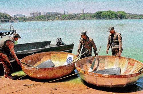 MEG personnel field-test the prototypes of the bamboo coracle designed by CSIR-NAL, at Ulsoor Lake.