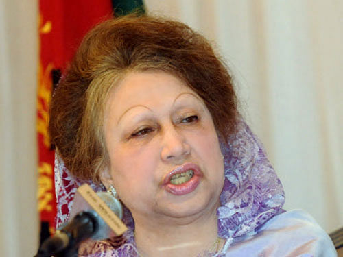 Former Bangladeshi premier Khaleda Zia and her fugitive son were today charged with corruption by a court here for allegedly collecting nearly USD 1 million in donations for charities named after her late husband. Reuters Photo