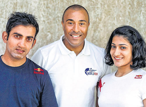 CLASSY TRIO Former world champion hurdler Colin Jackson (centre) is flanked by cricketer Gautam Gambhir (left) and badminton ace Ashwini Ponnappa in New Delhi on Wednesday. PTI