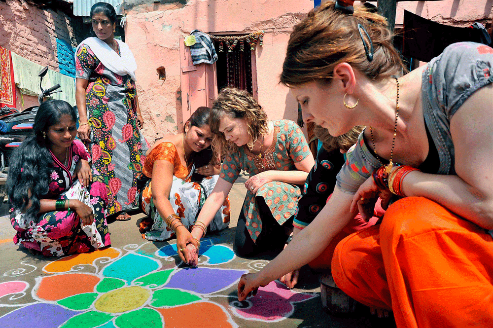The latest government report on Indian NGOs receiving foreign contribution states that Rs 11,546.29 crore was received in 2011-12, with Delhi and Karnataka figuring among the top recipients. PTI File Photo of foreigners working with women. For Representation Only.