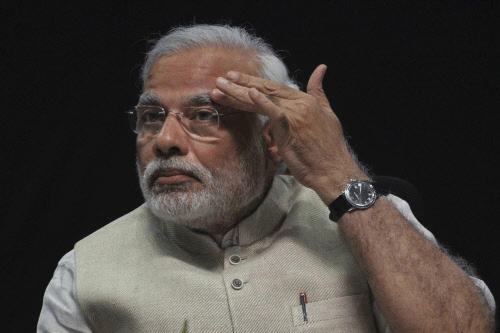 Congress today resurrected the maut ka saudagar barb against Narendra Modi, blaming him for the Godhra incident and the subsequent communal riots in Gujarat, and said the description fitted the BJP's Prime Ministerial candidate. AP photo