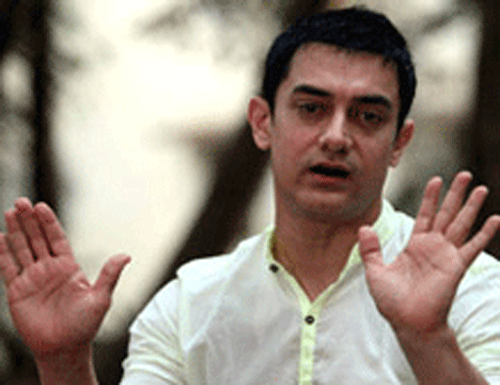 Bollywood star Aamir Khan today rejected allegations of misconduct and pressure tactics in connection with a redevelopment plan for his Pali Hill housing society amid claims that the members were being forced by him to sell their property. PTI photo
