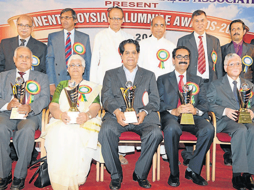 (From left) N&#8200;G&#8200;Mohan, Leena Fernandes, K&#8200;V&#8200;Kamath, Y&#8200;Sudhir Kumar Shetty and Allen C A Pereira, after receiving Aloysian Alumni Awards-2014, at a programme organised by St Aloysius College Alumni Association (SACAA) at college premises in Mangalore on Saturday. DHNS