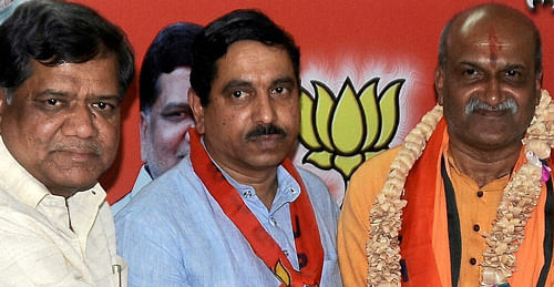 Sri Rama Sene founder Pramod Muthalik's entry into the BJP today forced the Congress and the NCP to form an alliance for the upcoming Lok Sabha polls in Goa. AP photo