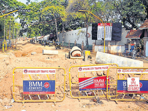 A view of  NH-212 road in Mysore where the UGD works are under progress. DH photo