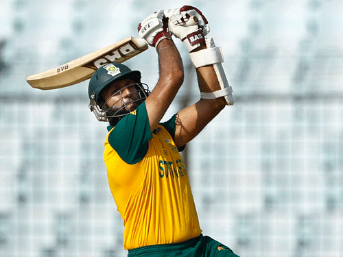 South Africa's Hashim Amla plays a shot during their ICC Twenty20 Cricket World Cup match against New Zealand, in Chittagong, Bangladesh, Monday, March 24, 2014. AP Photo