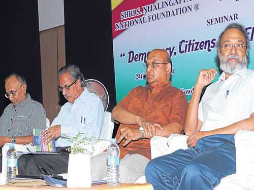 M&#8200;N&#8200;Vidyashankar, former additional chief secretary, Prof P S Jayaramu, Chairperson of Political Science Department, Bangalore University,  Dr Sandeep Shastri, Pro-Vice Chancellor, Jain University and K N Harikumar, former editor of Deccan Herald and Prajavani at a seminar on "Democracy, Citizens and Election in India" in City on Monday. DH photo