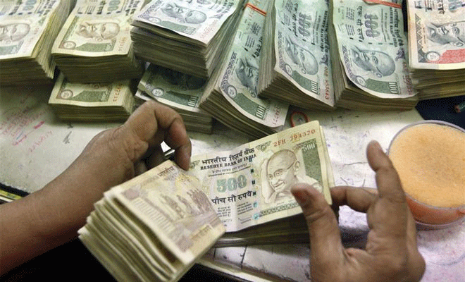 The rupee today gained 29 paise to close at seven-month high of 60.48 against the dollar on sustained selling of the US currency by exporters and banks. PTI File Photo