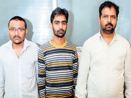 The Hawala operators - Dinesh Bai Patel, 43, Vipul Kumar Patel, 24, and Mahesh Kumar Patel, 32, - arrested by police. DH Photo