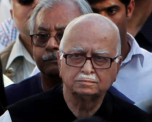 Unhappy BJP leader L K Advani on Tuesday went online to obliquely attack Narendra Modi by referring to his old blog on A B Vajpayee, saying the former prime minister has ''no trace of ego or arrogance''.  PTI file photo