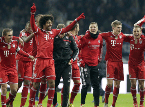 Bayern Munich clinched the Bundesliga title in record time by beating Hertha Berlin 3-1 on Tuesday thanks to goals from Toni Kroos, Mario Gotze and Franck Ribery with seven games left in the campaign, AP photo
