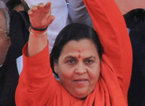 BJP today set at rest speculation that Uma Bharti could be fielded against Sonia Gandhi from Rae Bareli after the firebrand leader asserted that she "cannot leave my Jhansi" from where she has already been nominated, PTI photo