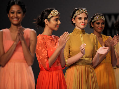 Models display creations by Rehane, during the Wills lifestyle Fashion Week in New Delhi, India, Saturday, March 29, 2014. AP Photo