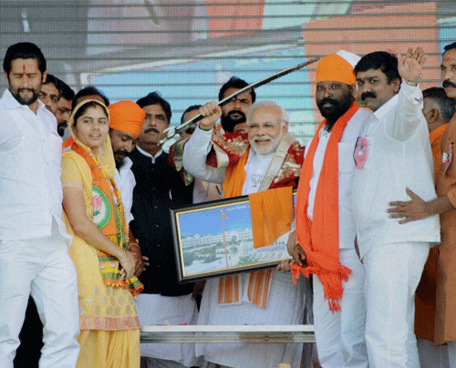 Nanded : BJP's Prime ministerial candidate Narendra Modi during the BJP- Shiv Sena joint election rally at Nanded ,Maharashtra on Sunday. PTI Photo