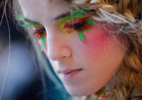 A model waits backstage before the Indian designer Manish Arora Fall/Winter 2014-2015 women's ready-to-wear collection show during Paris Fashion Week February 27, 2014. REUTERS